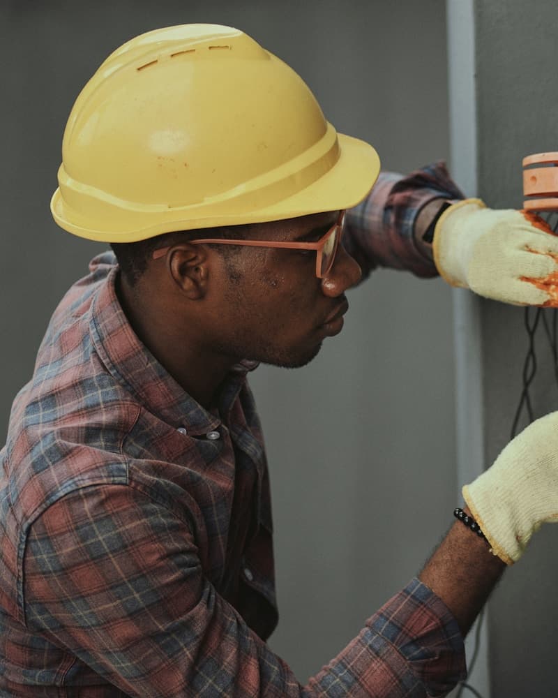Electrician working on a consumer unit